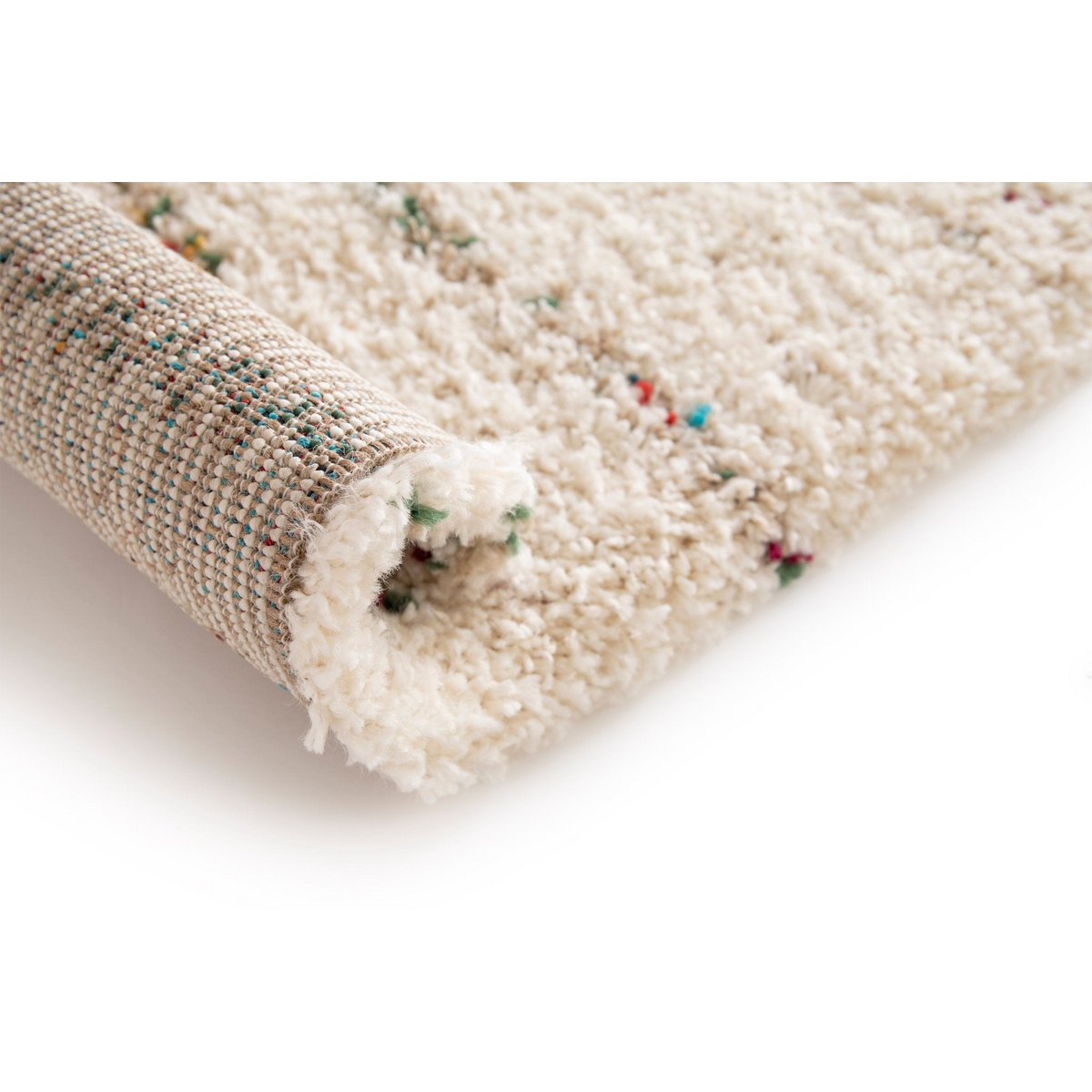 Weiche und voluminöse ethnische zottelige Teppichblüte