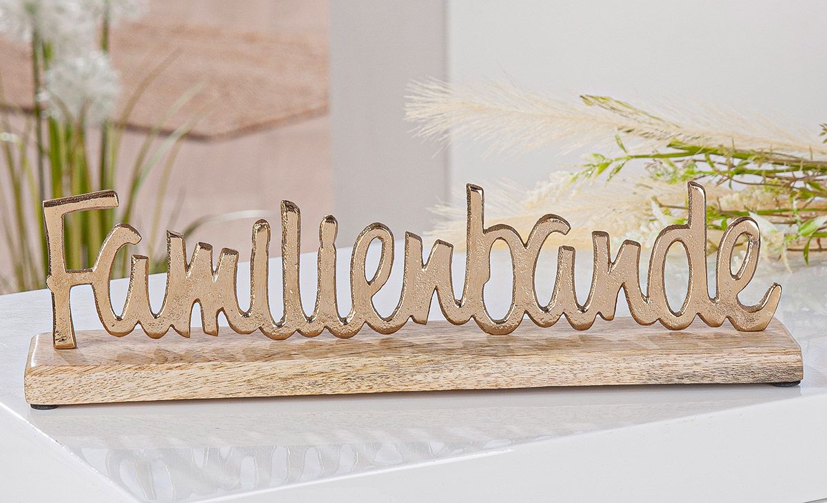 Schriftzug Familienbande aus Aluminium und Mangoholz