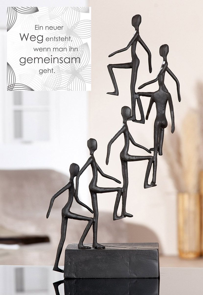 Skulptur Get Up Together aus Eisen mit Spruchkarte