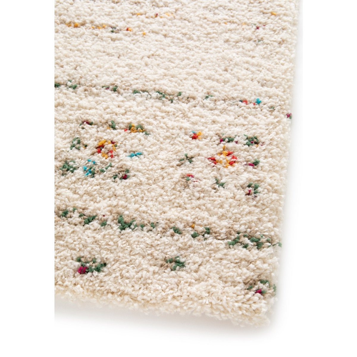 Weiche und voluminöse ethnische zottelige Teppichblüte