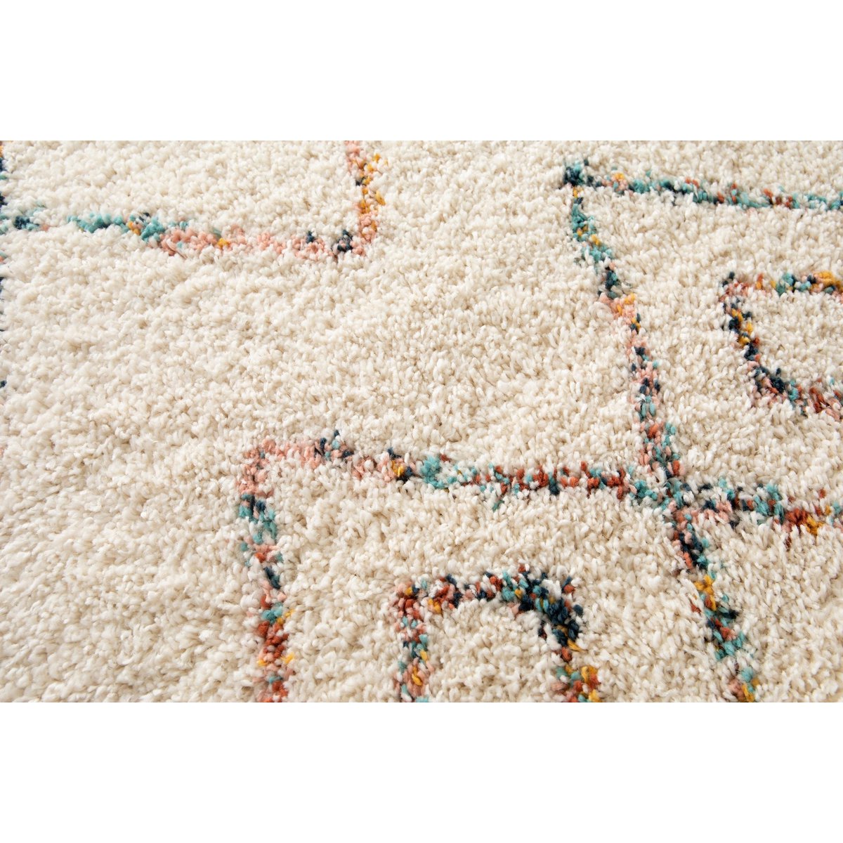 Zotteliger Teppich süß und voluminös Harlekin