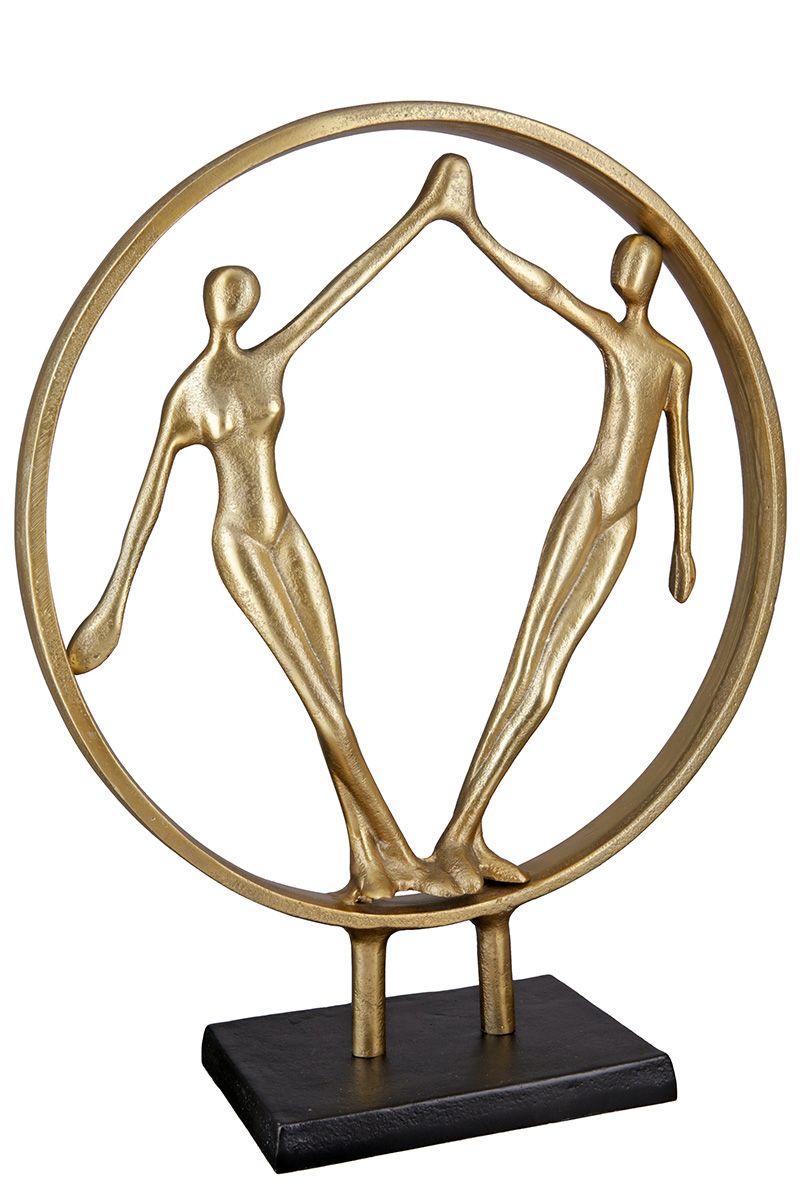 Hand in Hand - A gold colored decorative sculpture on a black metal base