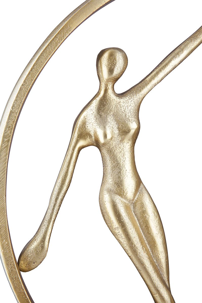 Hand in Hand - A gold colored decorative sculpture on a black metal base