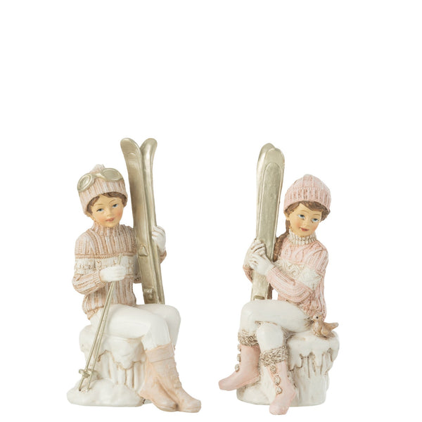 4er-Set Handbemalte Weihnachtsfiguren, Sitzende Mädchen und Jungen auf Skiern, Weiß/Rosa
