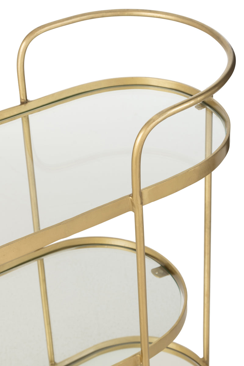 Elegant oval metal service trolley in mirror gold