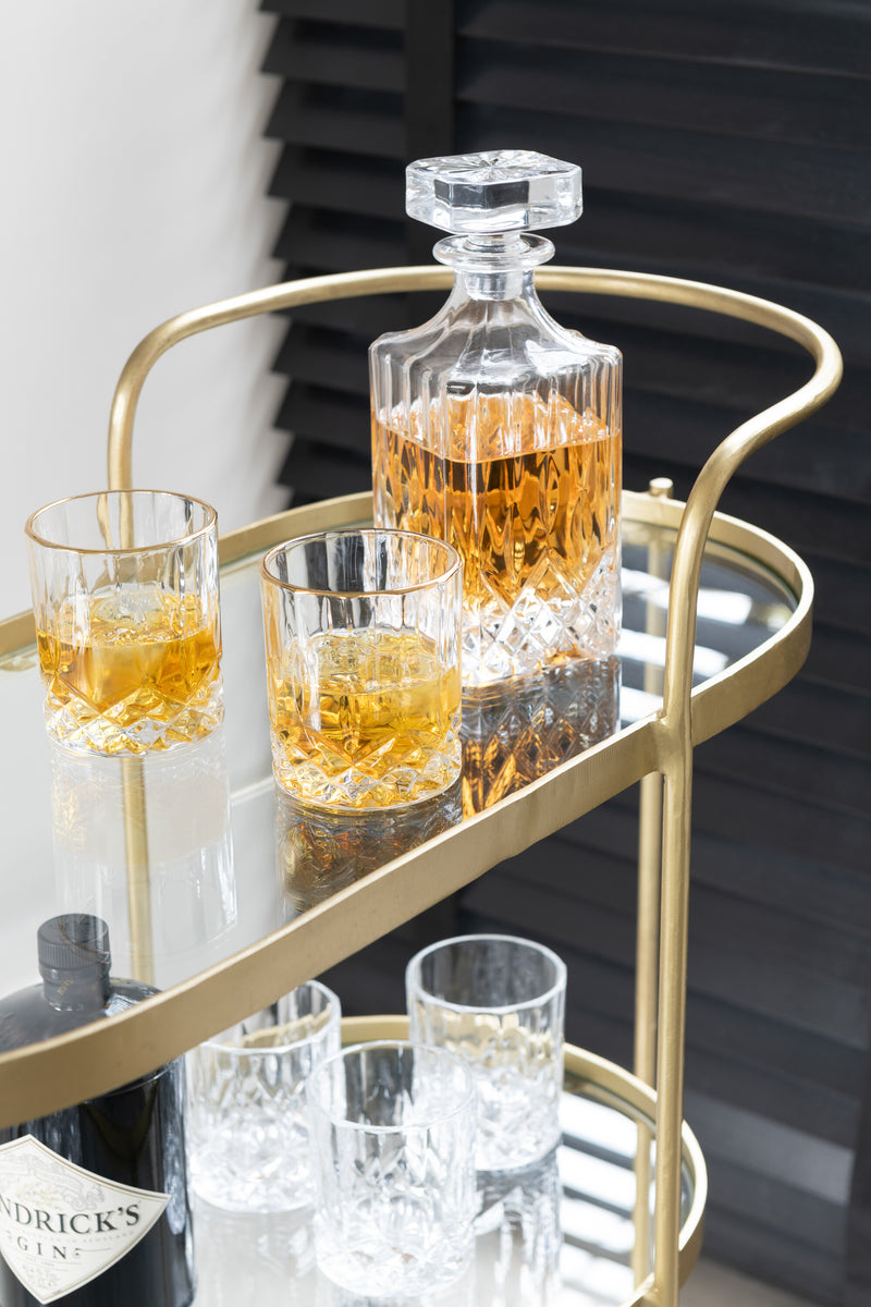 Elegant oval metal service trolley in mirror gold