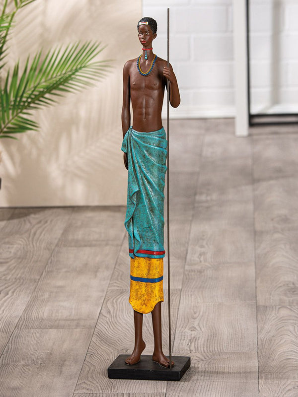 Arbore figure – Proud man motif in brown with colored details on a stand base