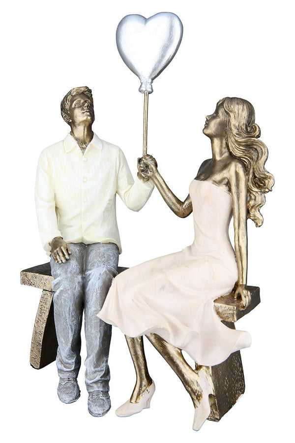 Resin figure of a loving couple Romantic sculpture in bronze look