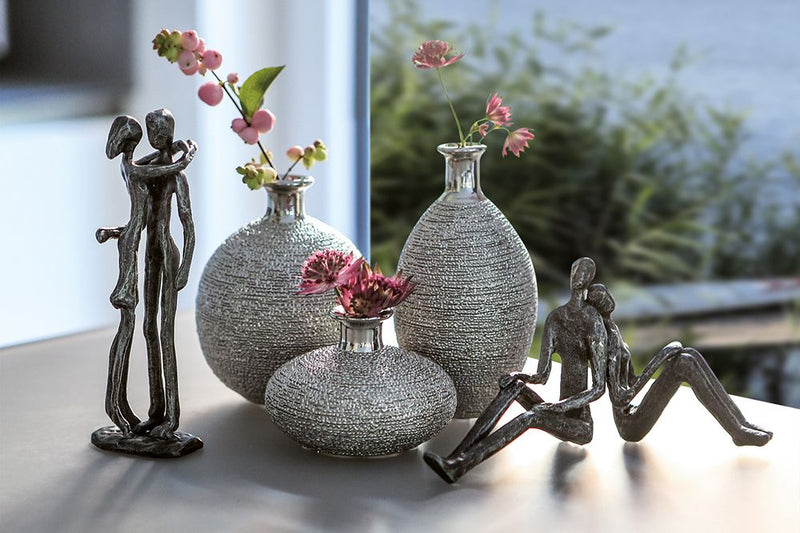 Exclusieve sculptuur Dream dreaming liefdevol paar gemaakt van ijzer zilver antieke finish met spreuk liefde maakt dromen waar