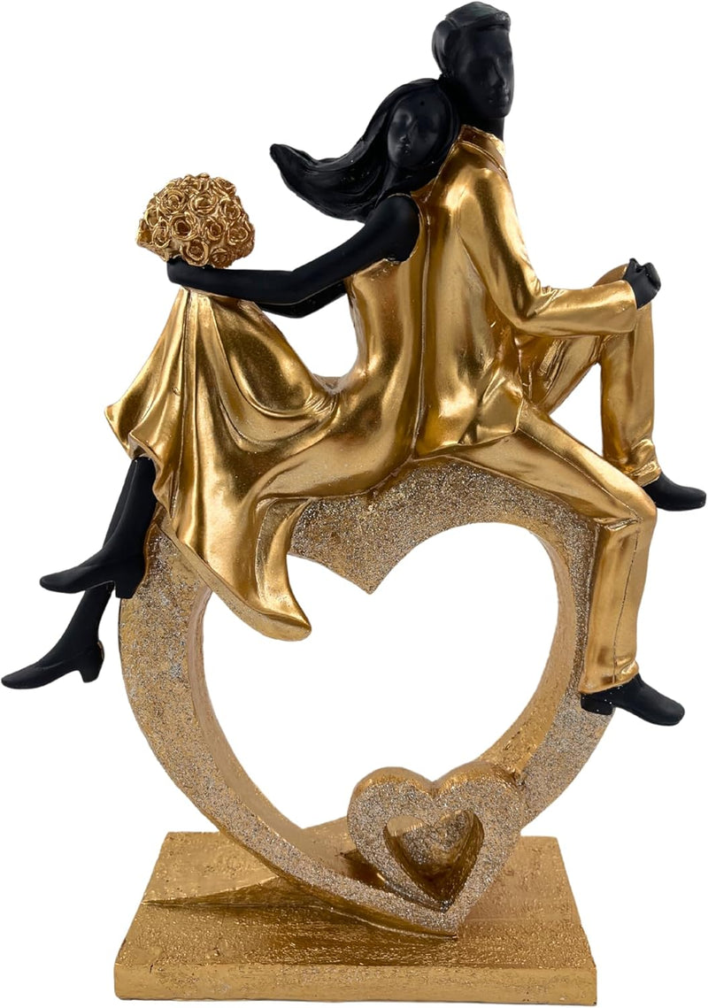Elegant sculptuur van een zittend echtpaar in de vorm van een hart, zwart en goud