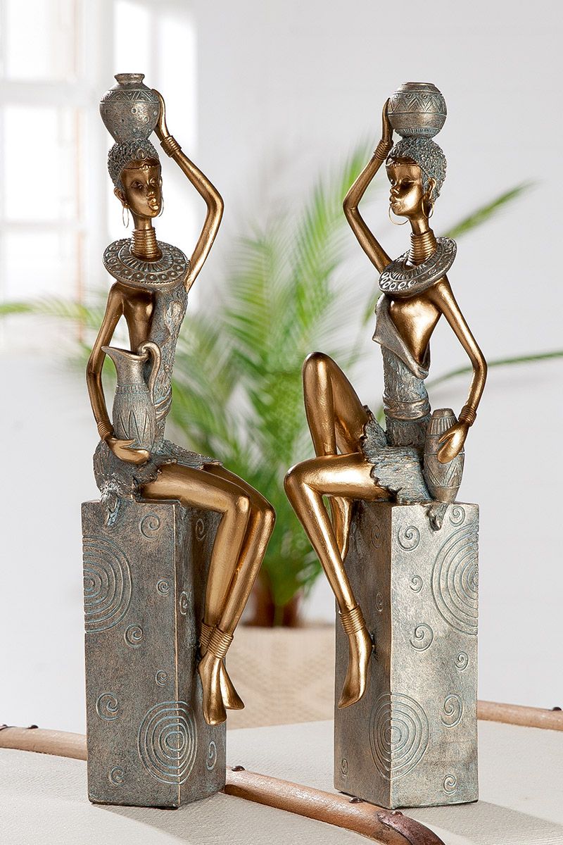 2 parts 'Jamila' figurine - Elegant, seated figurine in gold and gray with jug on head