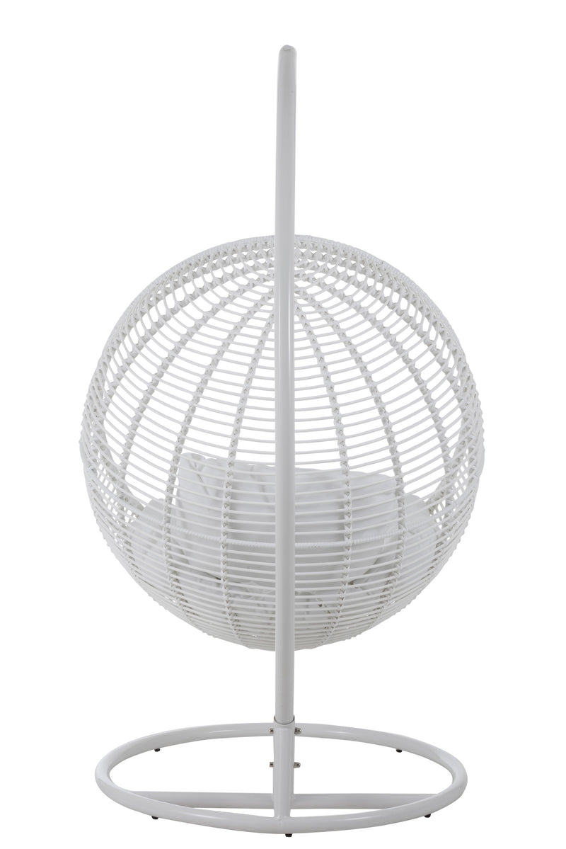 Round hammock chair made of steel and wicker in white: relaxation and coziness outdoors