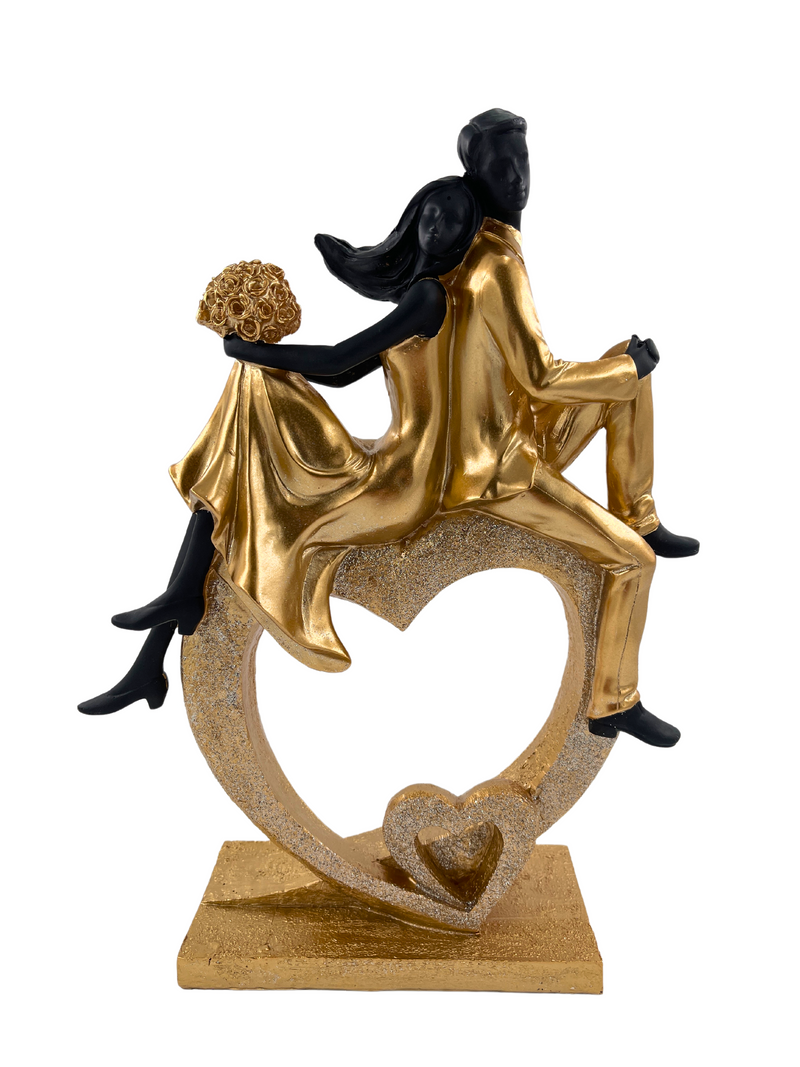 Elegant sculptuur van een zittend echtpaar in de vorm van een hart, zwart en goud