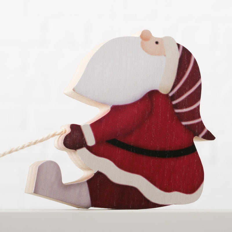 Weihnachtsdeko Kantenhocker Hauke - Holz Weihnachtsmann mit Schlitten 27cm