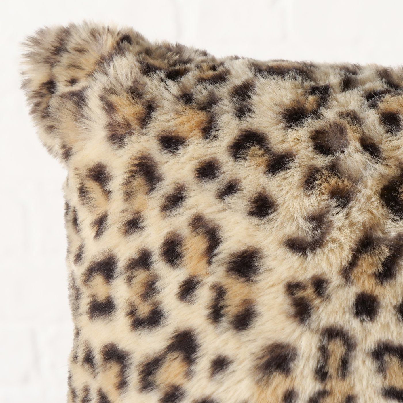 Faux fur cushion Wild Touch – soft sofa cushion with leopard print
