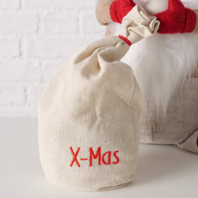 Doorstop Wichtel Fiete – Christmas decoration with red hat and X-Mas gift bag