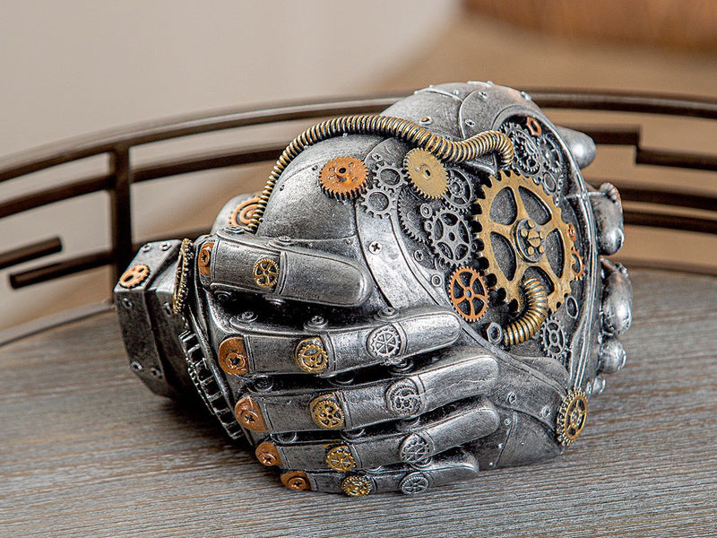 Poly sculpture steampunk heart in hands Love expression in mechanical art