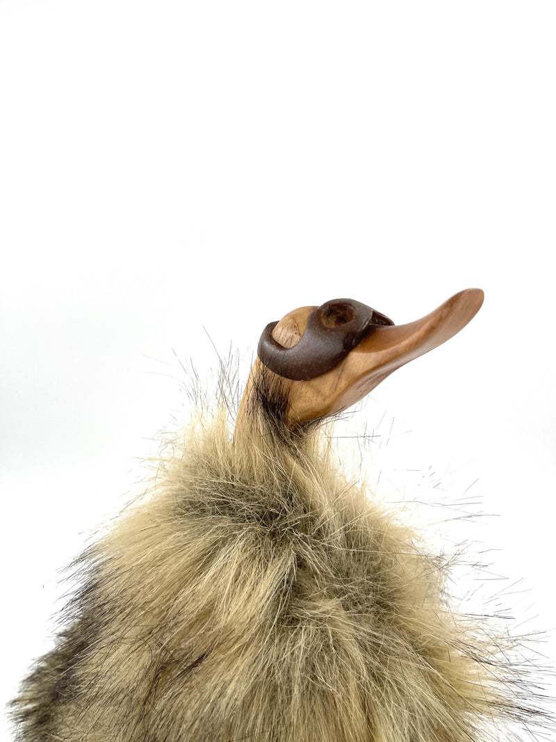 Decorative duck on skis made of wood and fur, brown 39cm