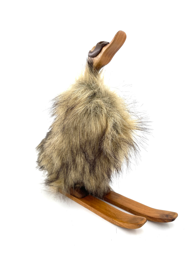 Decorative duck on skis made of wood and fur, brown 39cm