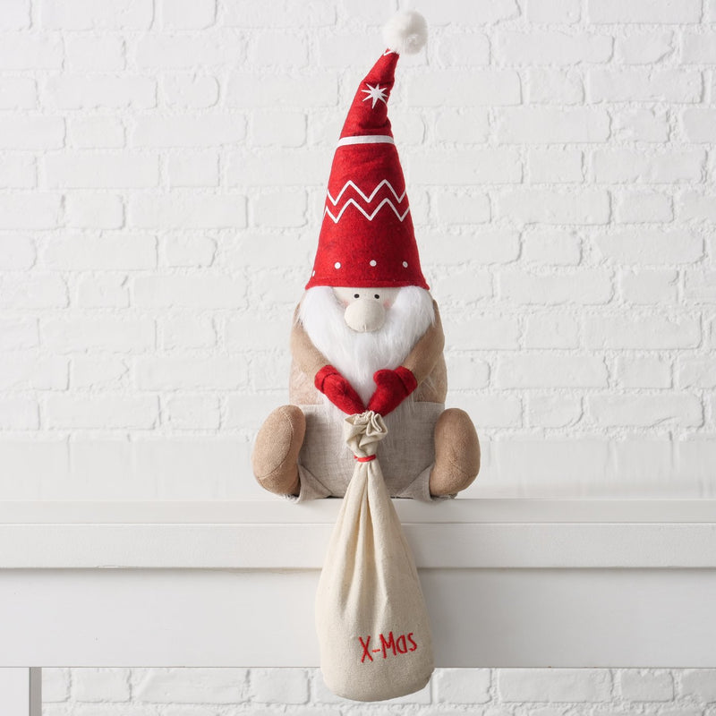 Doorstop Wichtel Fiete – Christmas decoration with red hat and X-Mas gift bag