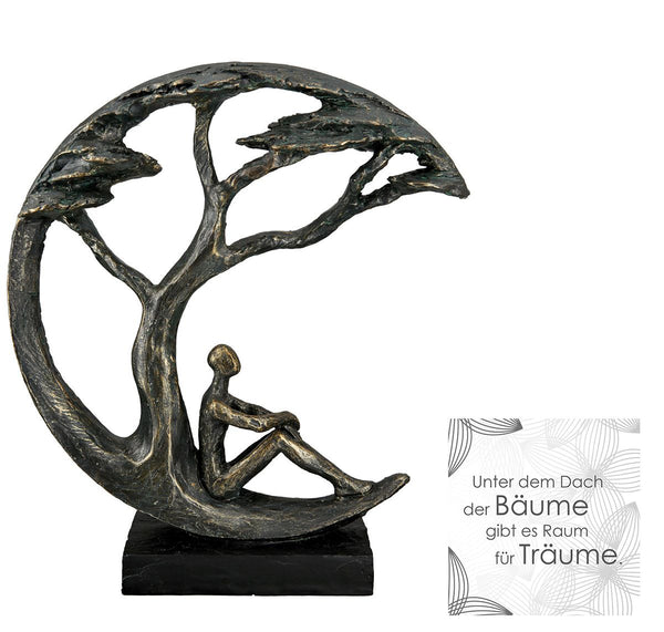 Poly sculpture Daydreamer in bronze on a black base with a message tag