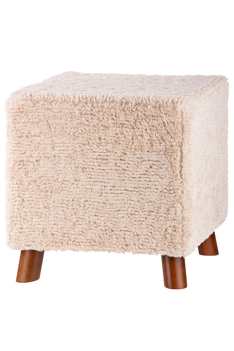 Cream colored handmade upholstered stool made of cuddly wool with oak wood feet
