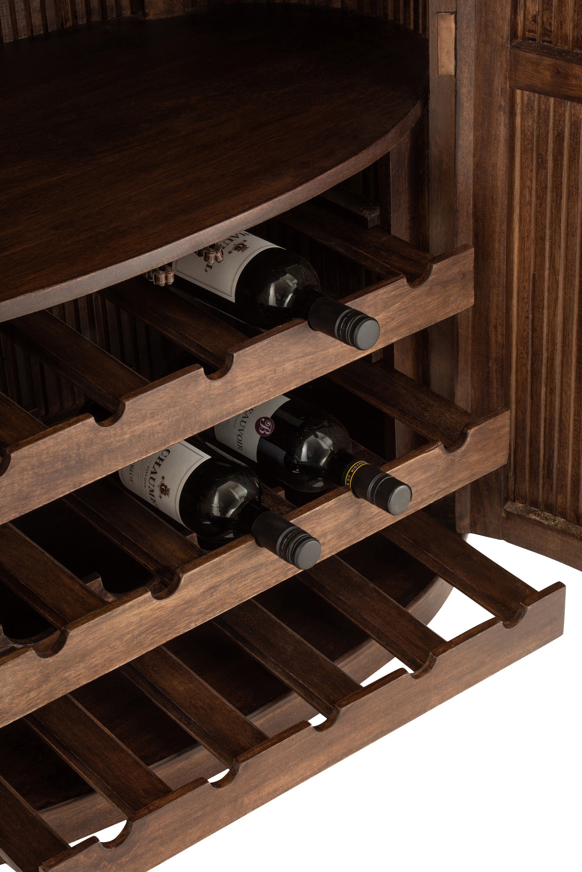 Exquisite design and functionality are combined in the handmade bar cabinet Reyi made of mango wood