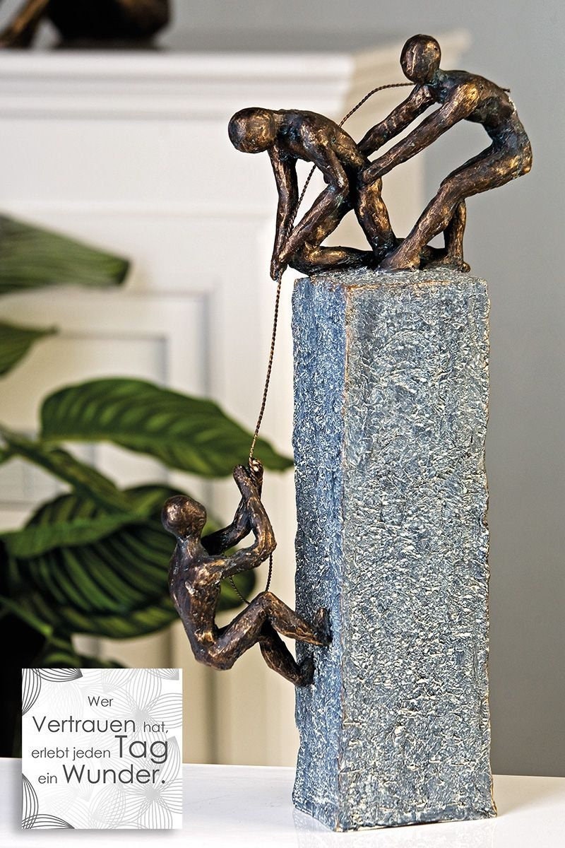 "Pull Me Up" Sculpture in Bronze on Gray Stone An expression of shared purpose and trust, handcrafted